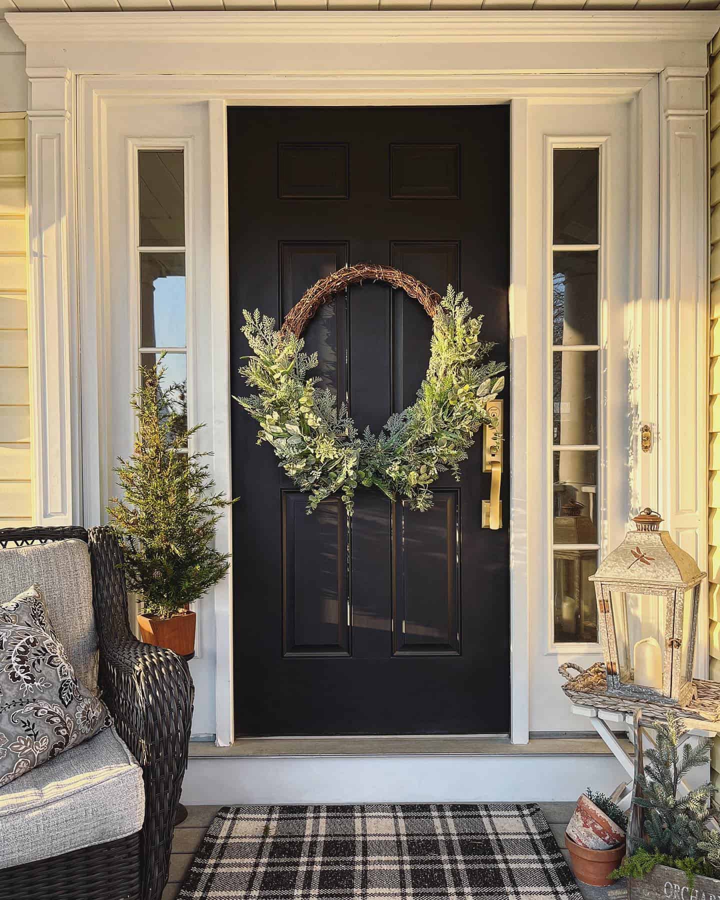 https://www.snazzylittlethings.com/wp-content/uploads/Black-Front-Door-Winter-Front-Porch-with-Plaid-Rug-and-Juniper-by-SnazzyLittleThings.jpg